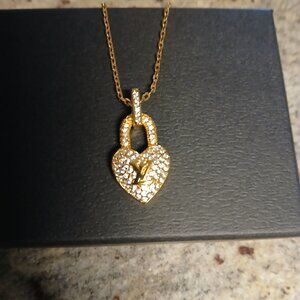 Gold tone adjustable heart pendant necklace